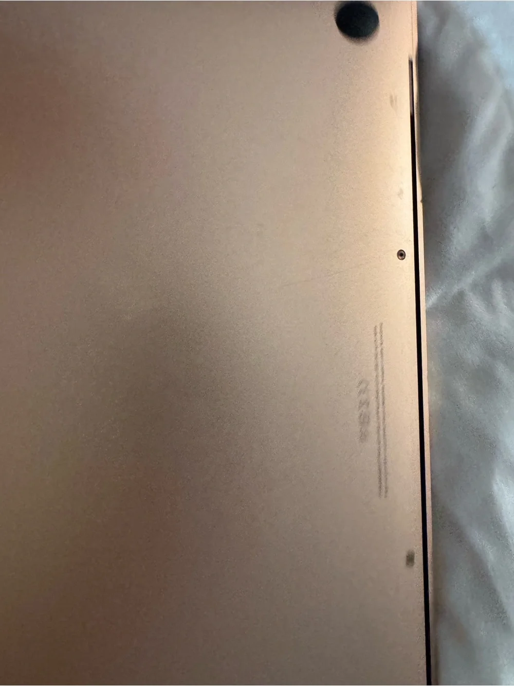 Apple Rose Gold MacBook M2179 does not turn on. For parts or repair only.